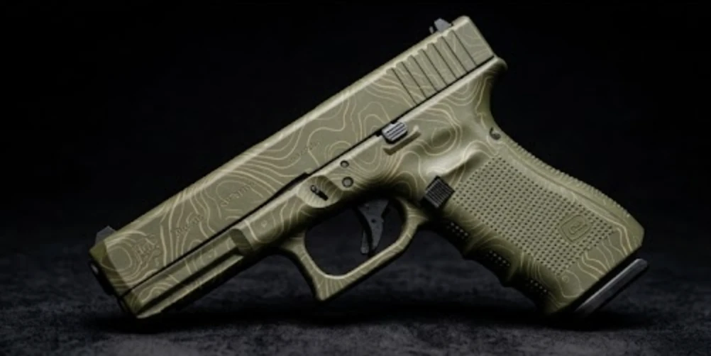 Monogram laser-imaged into an OD green Cerakote pistol