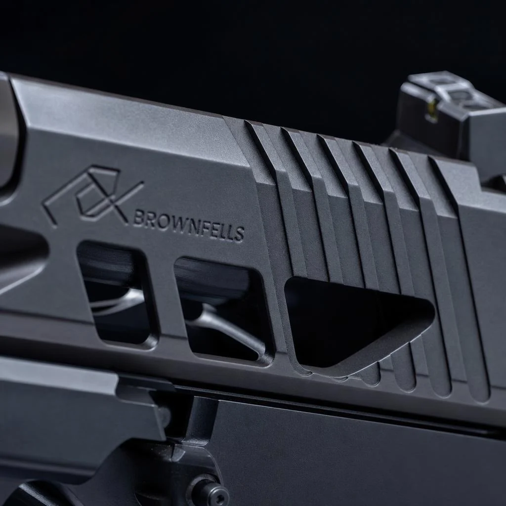 Custom slide serrations machined into a pistol slide